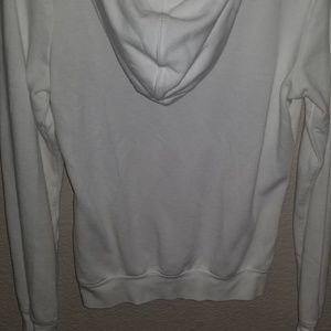 White and rose gold Nike sweater